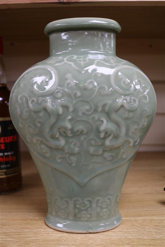 A Chinese celadon glazed vase height 18cm